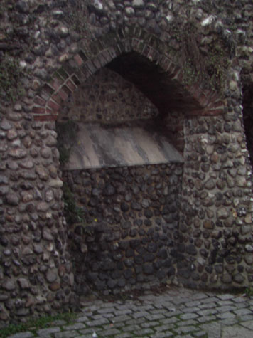 Partly blocked and rebuilt arch