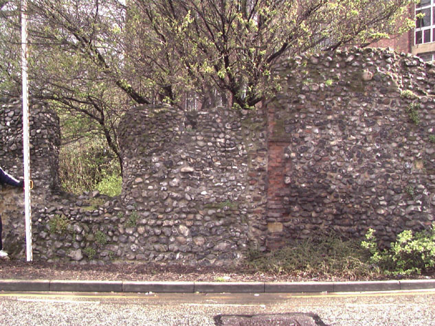 A window opening (?) and brick repair on the outer or west face of the wall at the south end