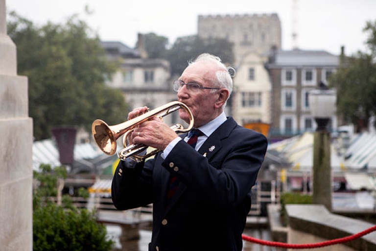 Trumpeter on City Hall steps