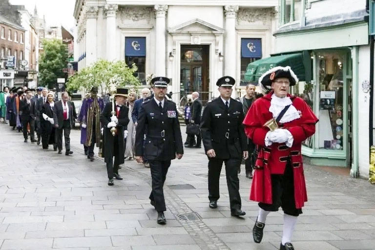 Civic heads, local community leaders and volunteers on traditional parade through the city centre