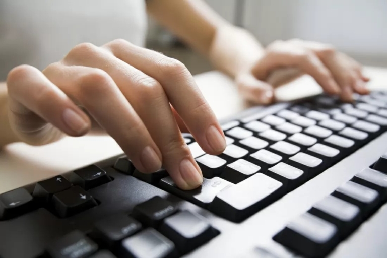 Someone accessing their council tax account using a laptop