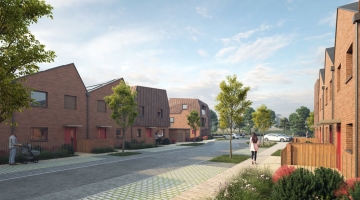  A tree-lined residential street with modern brick houses.
