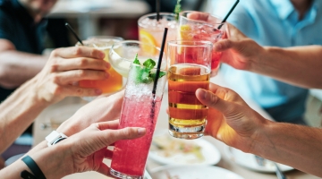 People toasting with alcoholic drinks