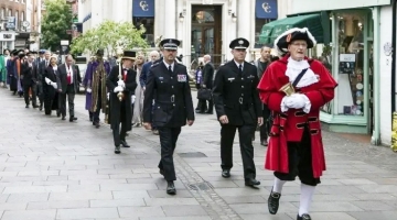 Civic heads, local community leaders and volunteers on traditional parade through the city centre