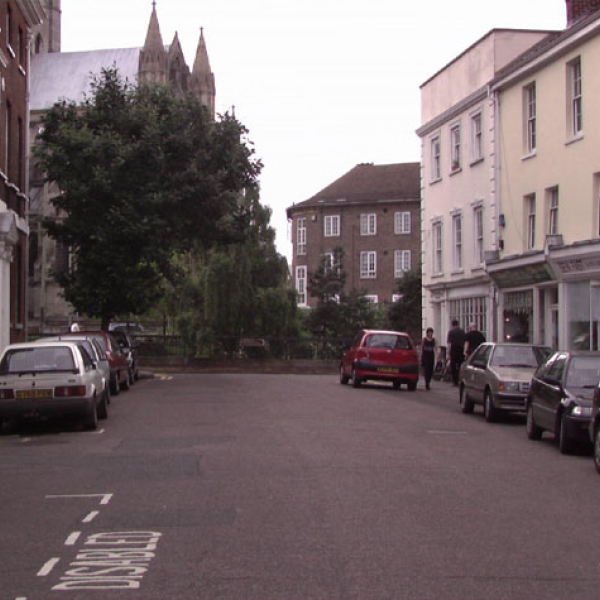 [6] View of the site of St Giles' Gate in 2001, from the east, from inside the city.  Note the three-storey house of three bays on the right that is shown on the view by Ninham.